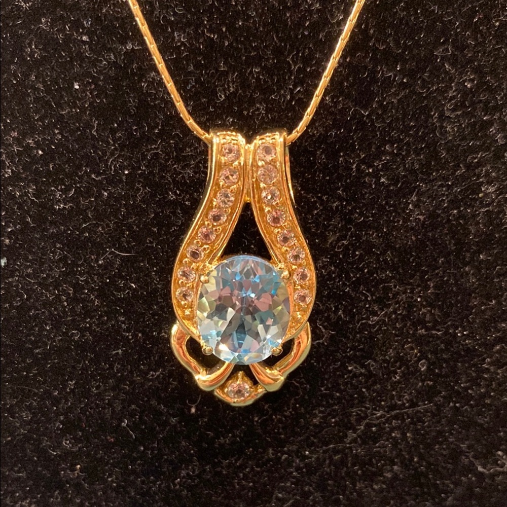 Gold and Blue Teardrop Necklace with Intricate Scrollwork